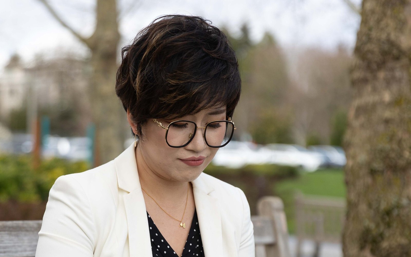Maggie Sun, Managing Broker, reviewing client documents in Bellevue