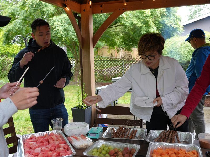 Maggie Sun Real Estate team at a summer team-building barbecue in the Seattle area
