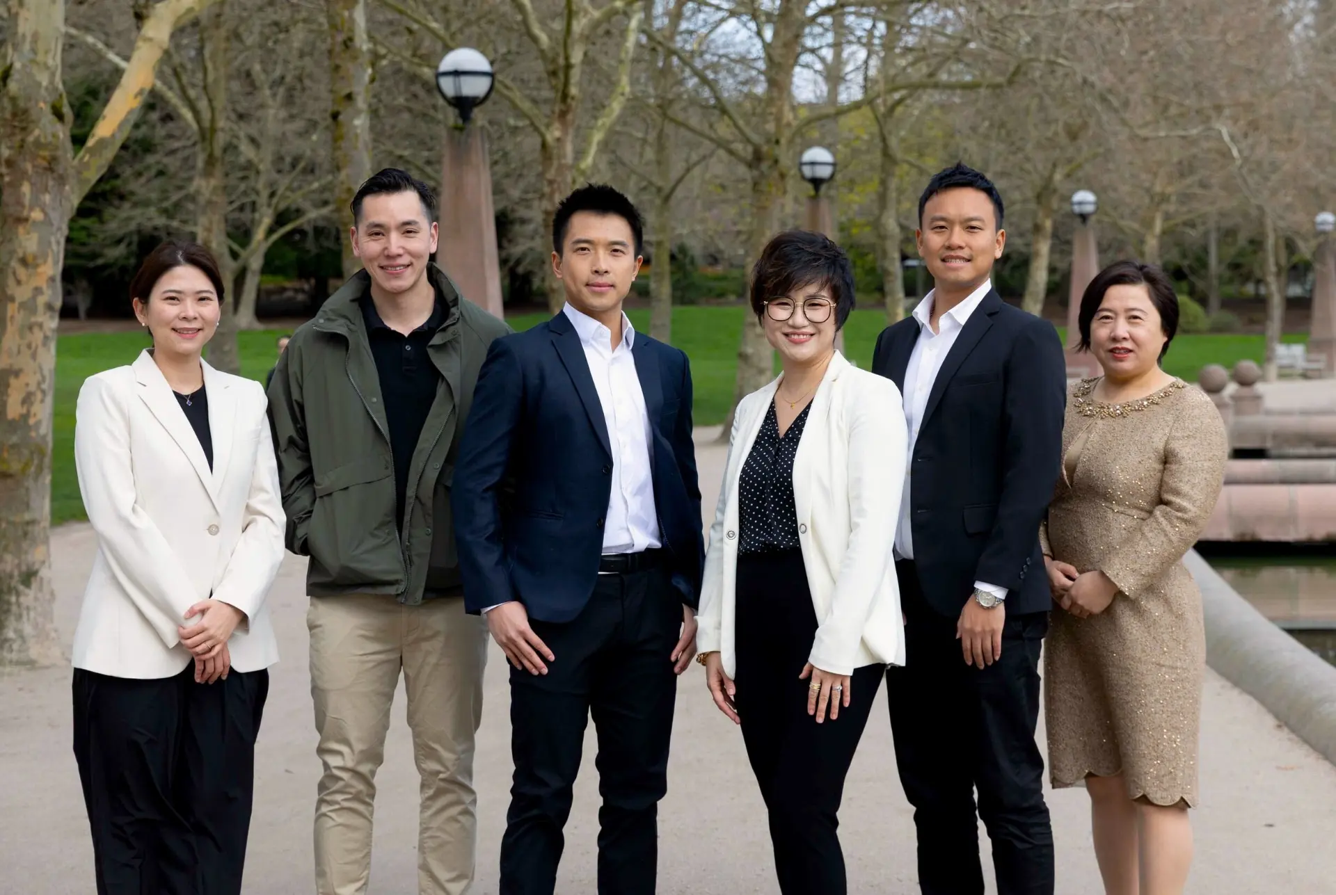 The bilingual Maggie Sun Real Estate team together in downtown Bellevue