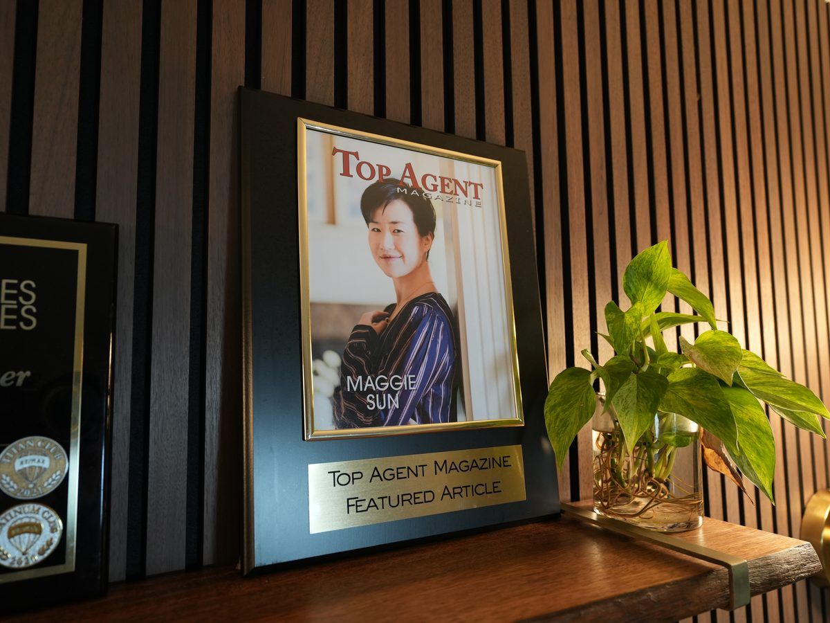 Maggie Sun Real Estate Bellevue office, featuring Top Agent Magazine recognition